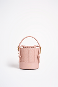 Grace Bucket rosa cipria di Oceane Paris, vista frontale con manico in pelle e chiusura a coulisse.